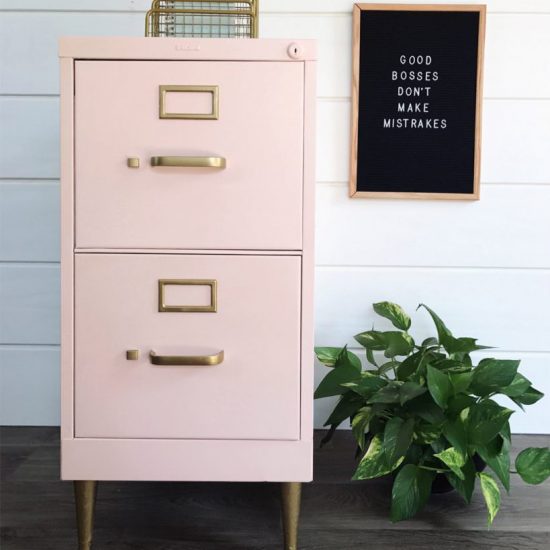 blush pink painted filing cabinet with gold legs and hardware