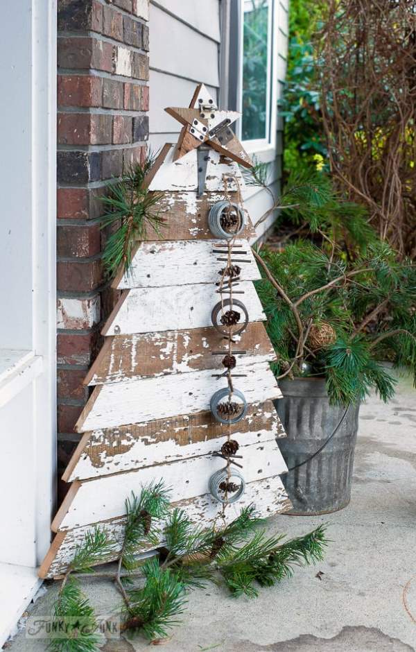 christmas tree with star made from recycled fence boards