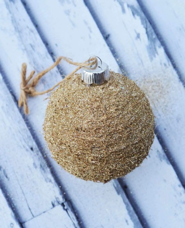 Tree ornament with gold glitter