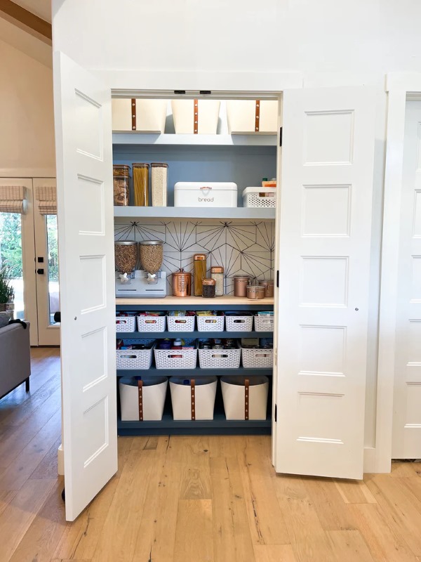 Small White Pantry with shelves, jars and containers for organization