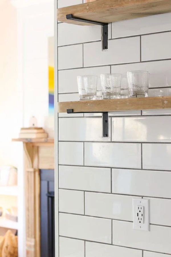 White Kitchen Tile Backsplash with Wooden Mounted Shelf