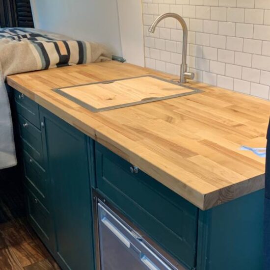 view of butcher block counter in camper van